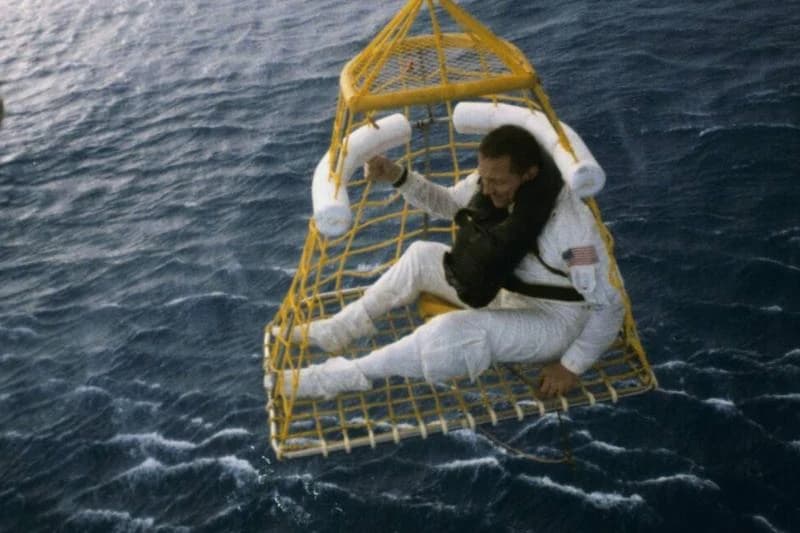 John Swigert Riding in a Rescue Basket