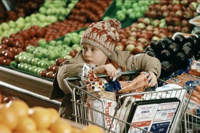 Macaulay Culkin grocery shopping as Kevin McCallister in Home Alone